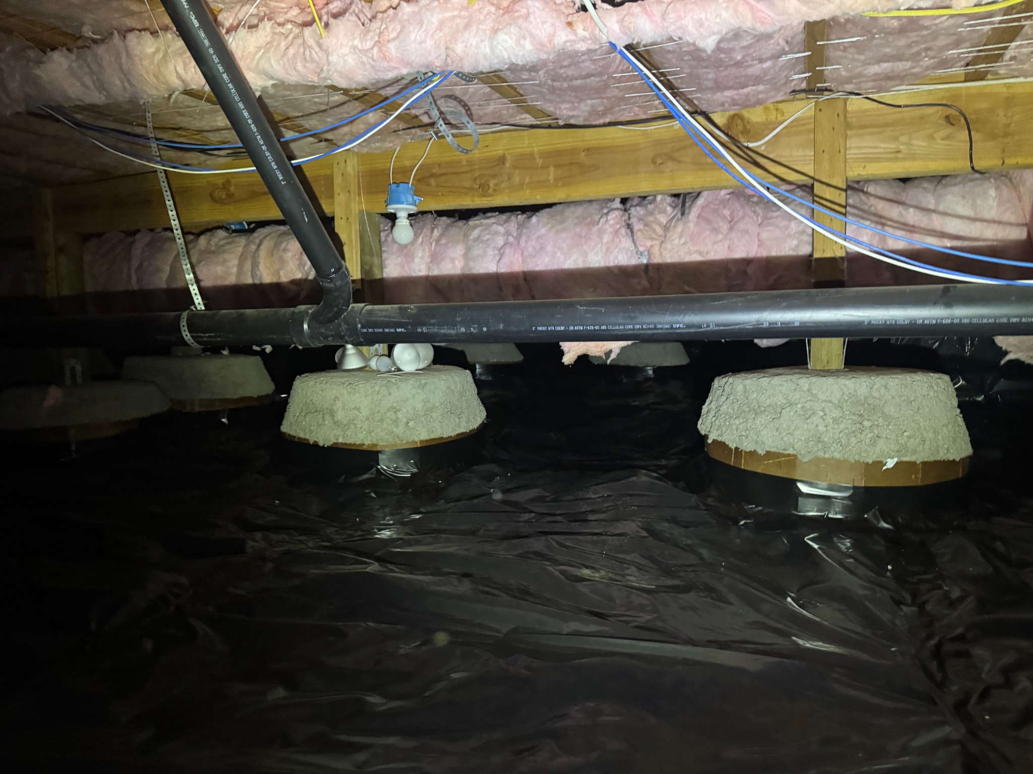 Crawl space insulation and vapor barrier work